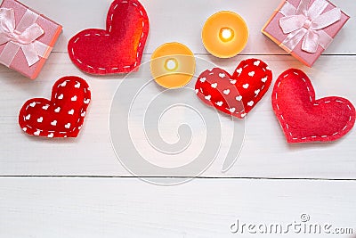 Red hearts and gift on white wooden background for Valentines day, copy space, top view Stock Photo