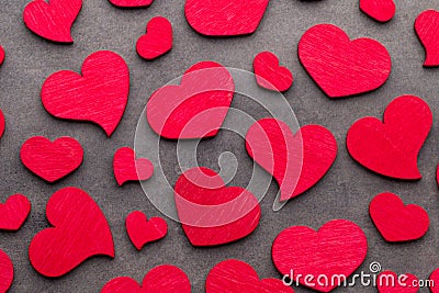 Red hearts on the wooden background. Stock Photo