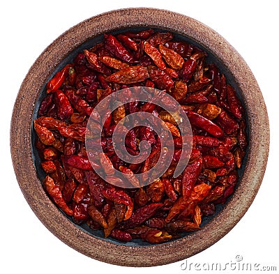 Red hot chilies pepper in pottery bowl, isolated Stock Photo
