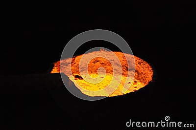 Red hot crucible with molten metal Stock Photo