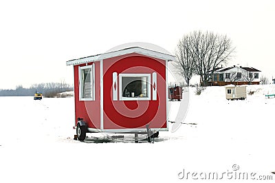 Red ice fishing cabin Stock Photo