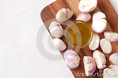 red inion water in a container on table, top view Stock Photo