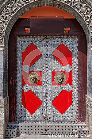 Red iron door in China Stock Photo