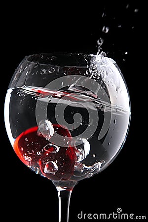 Red jelly heart in wine glass Stock Photo