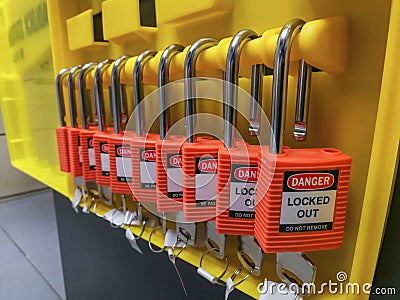 Red key lock and tag for process cut off electrical,the toggle t Stock Photo