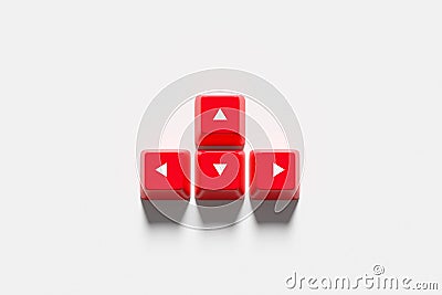 Red keyboard arrow keys showing up, down, left and right directions Stock Photo