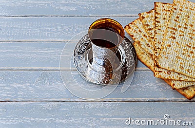 Red kosher wine with matzah or matza and a Passover Haggadah Stock Photo
