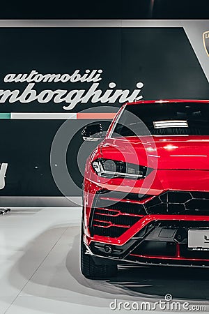 Red Lamborghini Urus on the car show Editorial Stock Photo