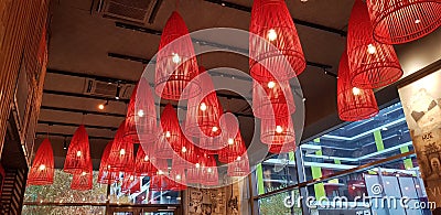 Red lamp shades in a Vietnamese restaurant Stock Photo