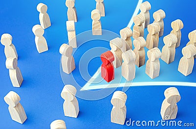 Red leader with followers in arrow formation direction breaks through the crowd. Breaking new ground. Society consolidation. Stock Photo