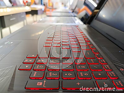 Red led light keyboard,paning. Laptop with red backlight, Choosing a laptop, gaming laptops, podshet on a laptop, how much to pay Stock Photo