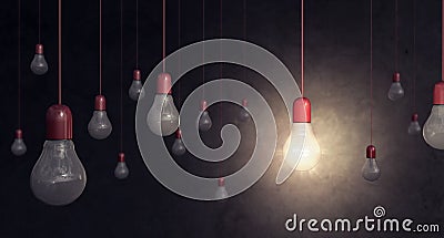 Red light bulb on dark background idea concept Stock Photo