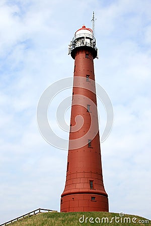 Red lighthouse along the dutch coast, IJmuiden Stock Photo