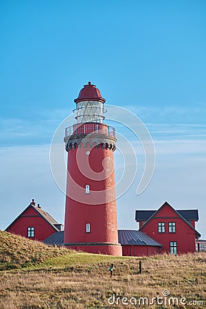Red lighthouse at the danish coast called Bovbjerg Fyr Stock Photo