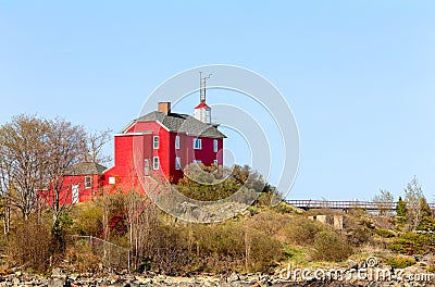 Red Lighthouse on Lake Superior in Upper Michigan Stock Photo