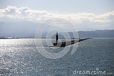 Red lighthouse in the port of Niigata on the northern coast of Japan. Stock Photo