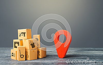 Red location pointer geolocation symbol and cardboard boxes. Global market and business, import and export. Distribution delivery Stock Photo