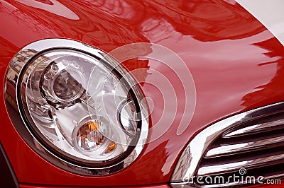 Red luxury car and headlamp Stock Photo