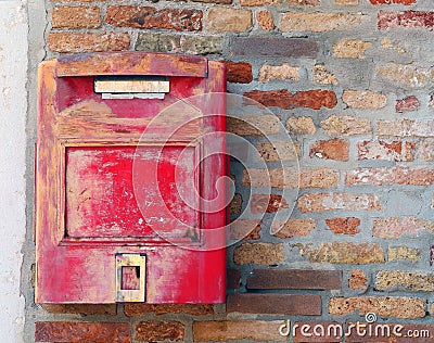 Red mailbox where to mail letters and postcards Stock Photo