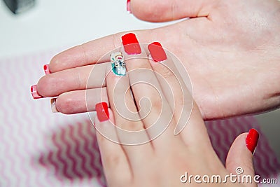 Red manicure, women handle Stock Photo