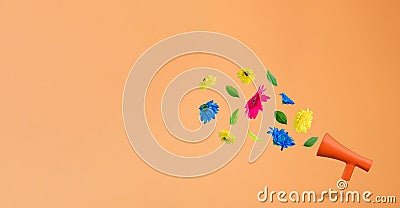 Red megaphone with flowers flying on a orange background with blank space. Positive news, thinking and energy concept. Optimistic Stock Photo
