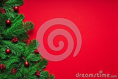 Red Merry Christmas Background with Fir branch an Baubles Stock Photo