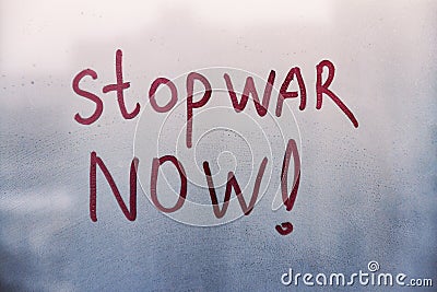 Red message call Stop war now are painted handwriting on blue window with raindrops Stock Photo