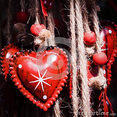 Red Metal Decorations, Heart Form, with Ropes and Red Pearls, for Valentines and Christmas Stock Photo