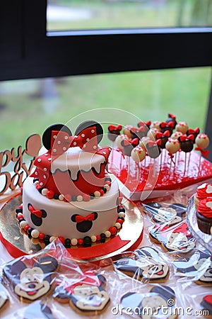 Red Mickey Mouse cake for birthday celebration. Editorial Stock Photo