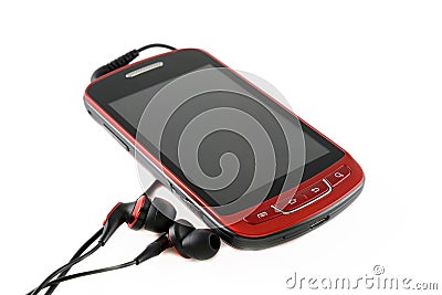 Red mobile phone with headsets Stock Photo