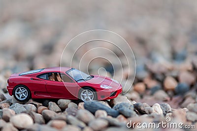 Toy car on gravel Editorial Stock Photo