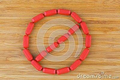 Red multi Vitamins arrange in Stop sign. Film coated tablets of Stock Photo