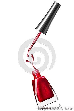 Red nail polish bottle with splash Stock Photo