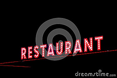 Red neon restaurant sign glowing in the night Stock Photo