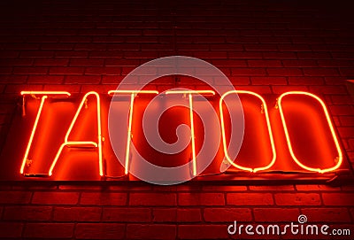 Neon Tattoo Sign Stock Photo