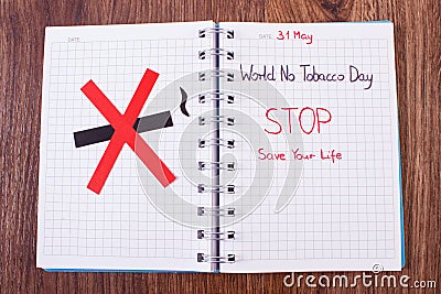 Red no smoking sign, world no tobacco day in notebook Stock Photo