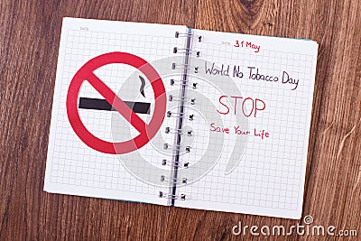 Red no smoking sign, world no tobacco day in notebook Stock Photo