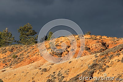 Red ochre lands or ocher marl in Corbieres, France Stock Photo