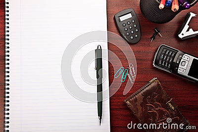 Red office desk with stationery Stock Photo