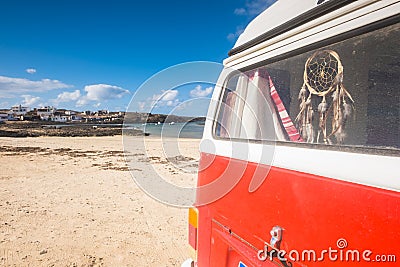 Red old van near a fisherman town in fuerteventura Stock Photo