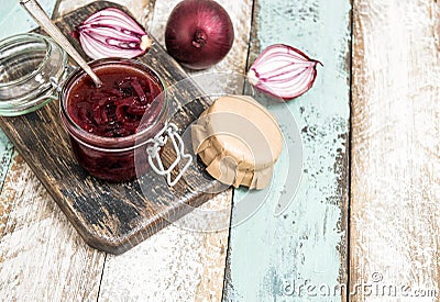 Red onion marmalade in jar Vegetable jam Stock Photo