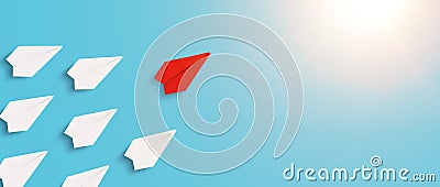 Red origami paper plane flies in front of the white plane. Leading organization towards its goals Stock Photo