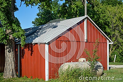 Red Outbuilding with Gas Propane Tank Stock Photo