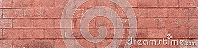 Red painted concrete block wall panorama, weathered urban texture, creative copy space Stock Photo