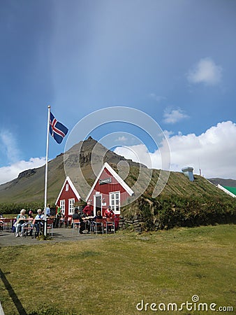 Red painted wooden houses with grass roof in Arnastapi, Snaefellsnes, Iceland Editorial Stock Photo