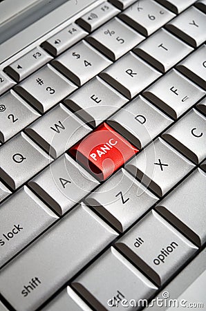 Red Panic Button on Computer Keyboard Stock Photo