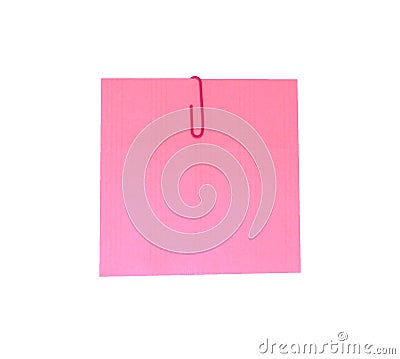 A red paperclip with blank pink notepaper. Pink sheet for your message or adding more text. Memo note with paper clip Stock Photo