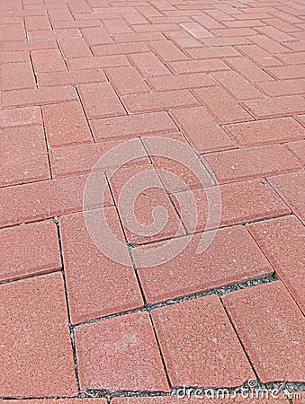 Red paving block or conblock floor. Side view diagonal alignment.? Stock Photo
