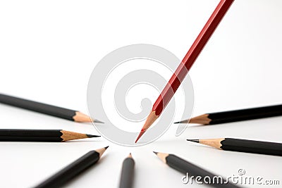 Red pencil standing out from crowd of plenty identical black fellows business success concept. Stock Photo