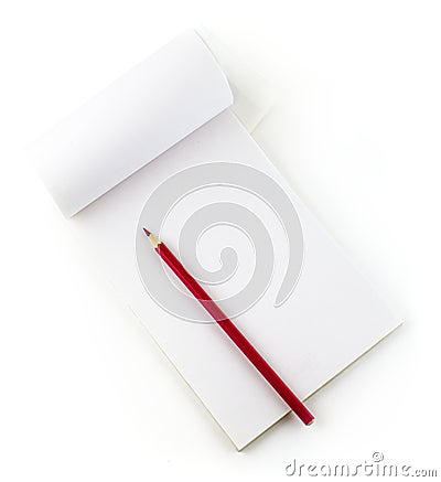 Red pencil on white notepad Stock Photo